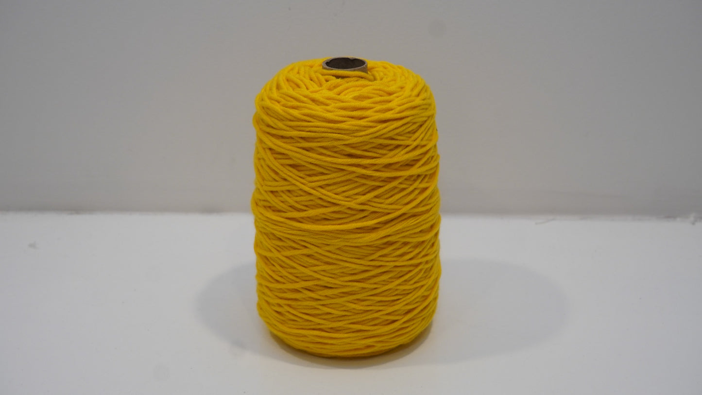 Golden yellow tufting yarn single skein detail view
