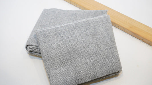 Folded grey premium tufting cloth for rug making