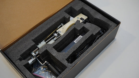 Long AK-V Pro tufting gun packed securely in its presentation box
