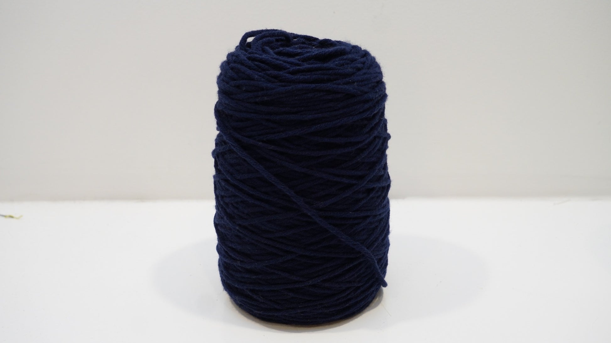 Deep navy tufting yarn single skein detail view