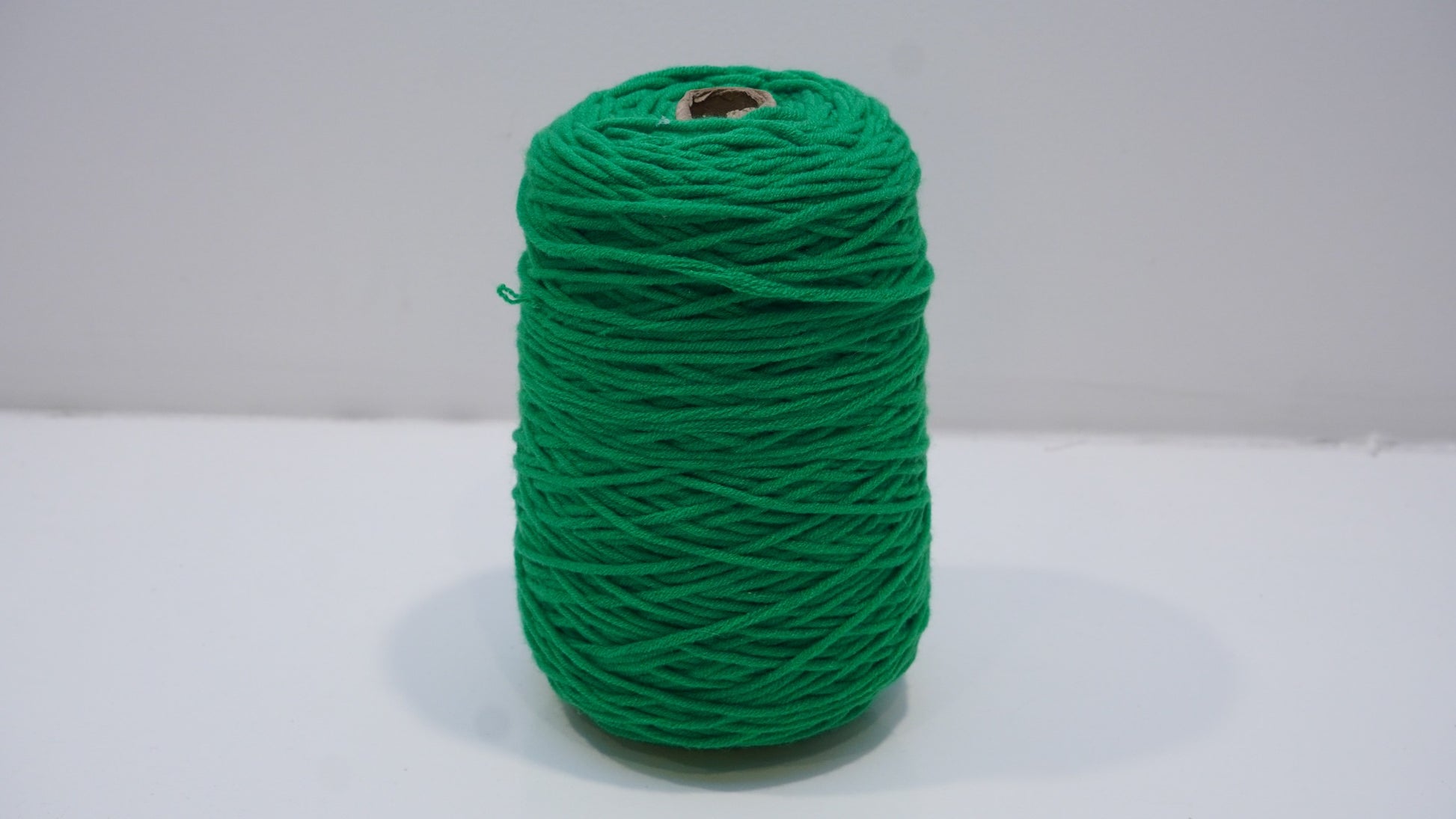 Emerald green tufting yarn single skein detail view