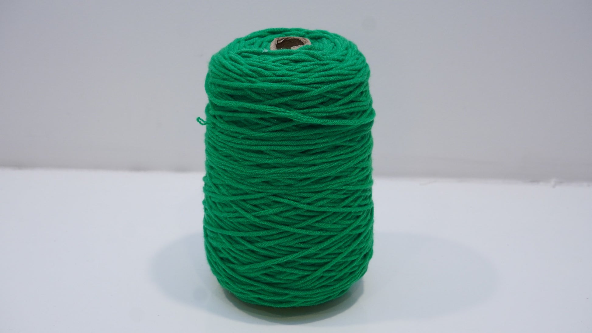 Emerald green tufting yarn single skein front view