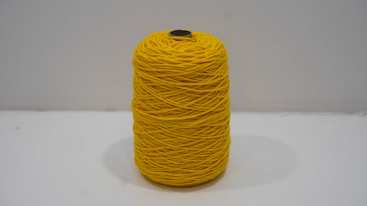 Golden yellow tufting yarn single skein detail view