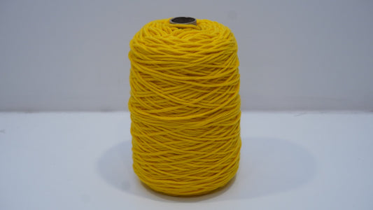 Golden yellow tufting yarn single skein front view
