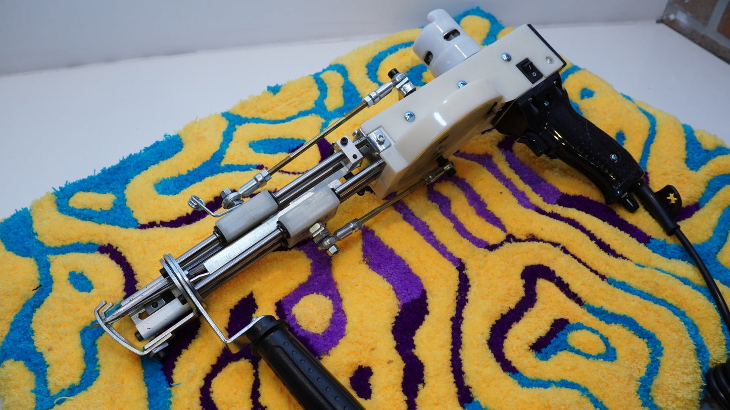 Detailed angled view of the Long AK-V Pro tufting gun