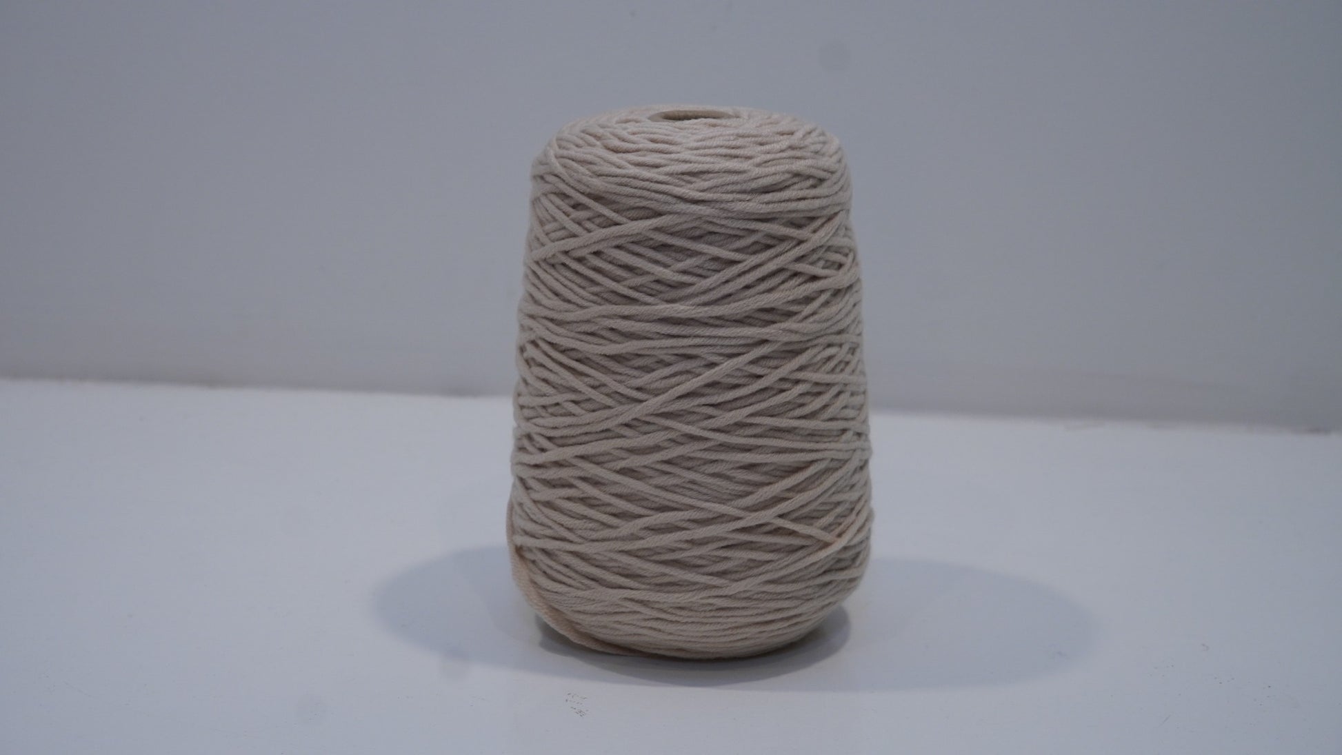 Stone beige tufting yarn single skein front view