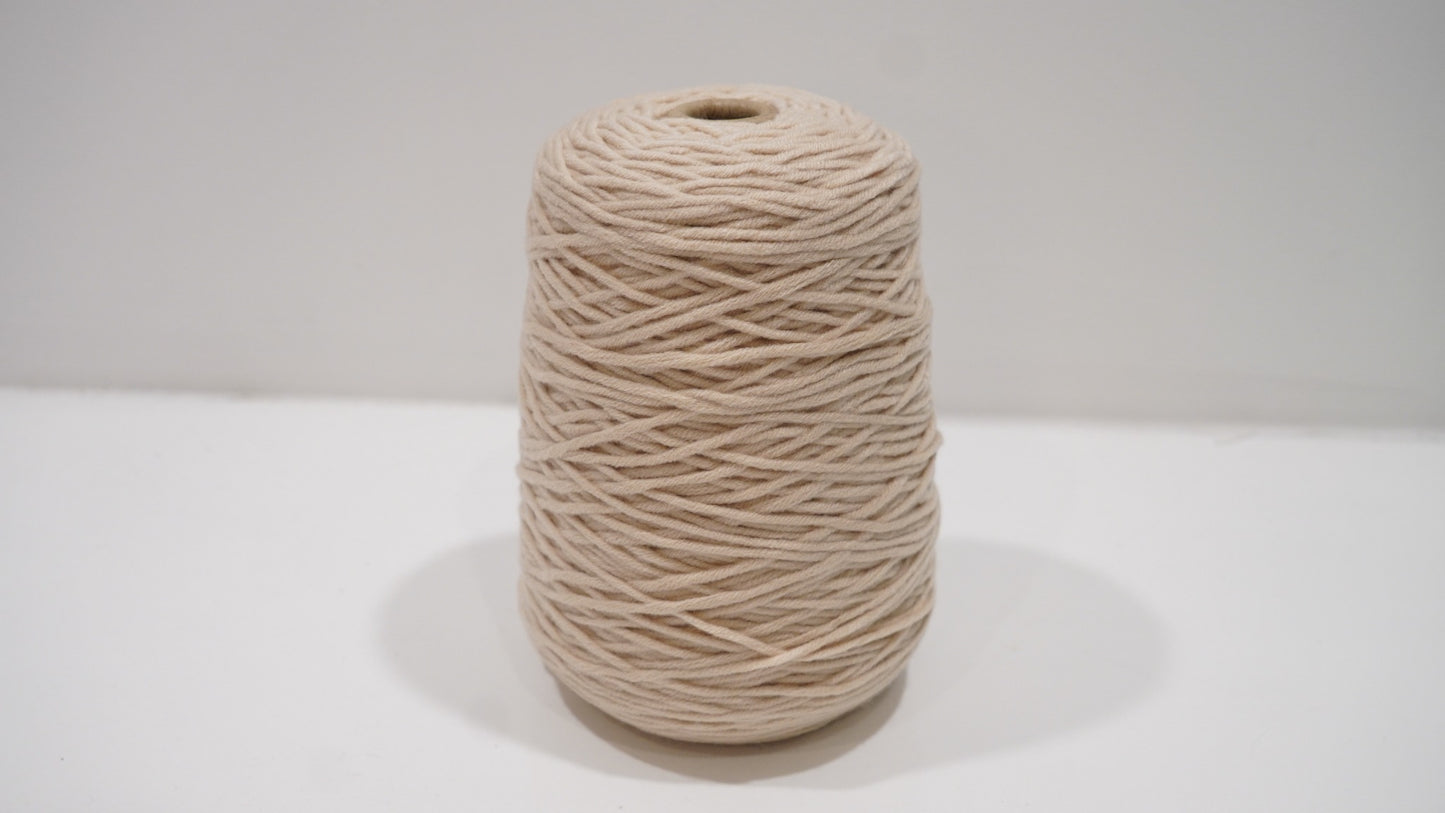 Warm beige tufting yarn single skein front view