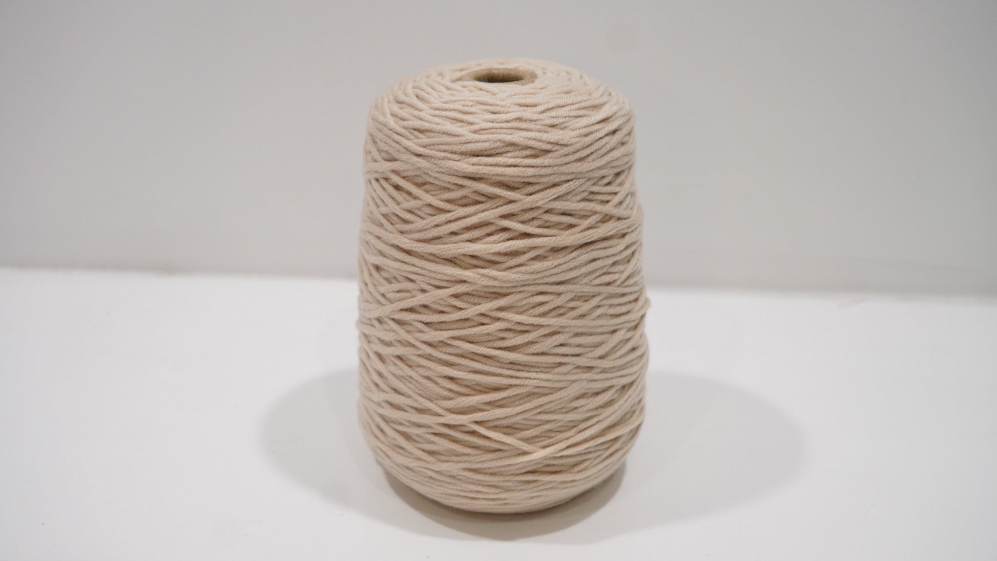 Warm beige tufting yarn single skein front view