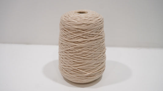 Warm beige tufting yarn single skein front view
